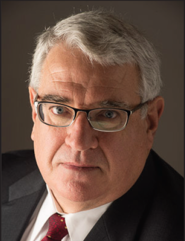 John K. Smith, President & CEO