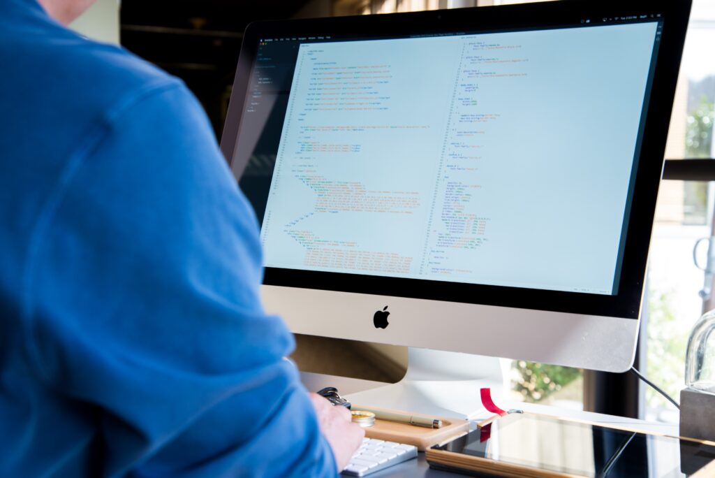 pexels-man-1839500 Person looking at computer screen